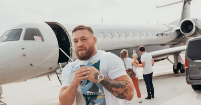 Conor McGregor and partner Dee Devlin board luxury private jet with €2,500 Louis Vuitton suitcase