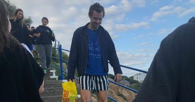 Harry Styles enjoys a dip at popular Dublin swimming spot surrounded by fans