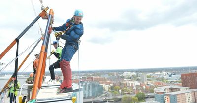 TV stars become real life superheroes and descend dizzying heights to help poorly kids