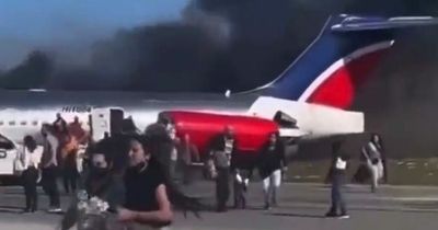 Miami plane crash: Passengers flee from burning aircraft after it smashes into runway