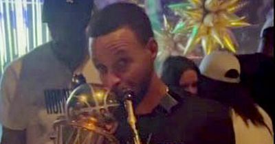 Steph Curry holds £770 bottle of tequila as he kisses MVP trophy in Warriors celebrations