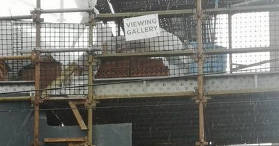 Mum's anger after builders put 'viewing gallery' sign outside her bedroom window