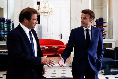 Analysis-Macron needs to turn foes into friends and woo conservatives