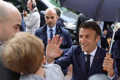 We can find a new majority, Macron says after losing control of parliament