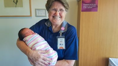 Mater Brisbane volunteer Gwen Grant clocks up 15,000 hours with newborns