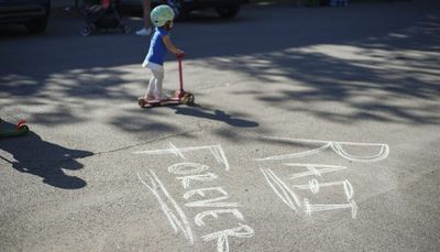 Neighbors gather to mourn Lincoln Square toddler killed by car, push for cyclist safety measures