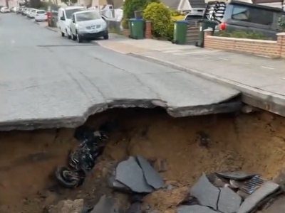 Motorbiker ‘plunges into’ 20ft sinkhole which opened up before him in London street