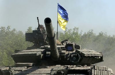 EU debates Ukraine candidacy as Russia makes life 'hell' in east
