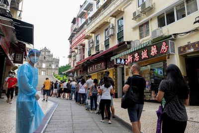 Macau extends COVID shutdown of city, casinos stay open