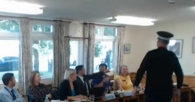 "This hasn't happened before!": Police officer forced to abandon council meeting... to chase suspected shoplifter he spotted out the window