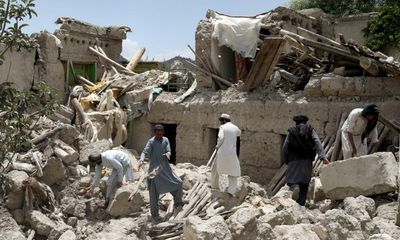 Afghan earthquake survivors dig by hand as rescuers struggle to reach area