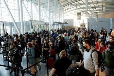 Airports battle long lines, cancelled flights