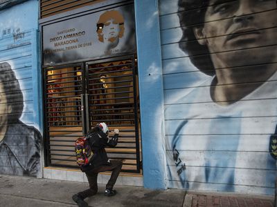 An Argentine judge orders 8 to face a homicide trial in soccer star Maradona's death