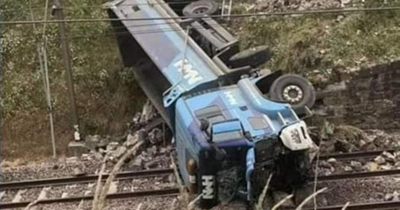 East Lothian railway blocked as lorry plummets down embankment onto tracks