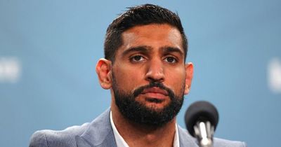 Three men charged after Amir Khan robbed at gunpoint for £72,000 watch