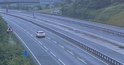 BMW in middle lane of M5 at 5am sparks online row