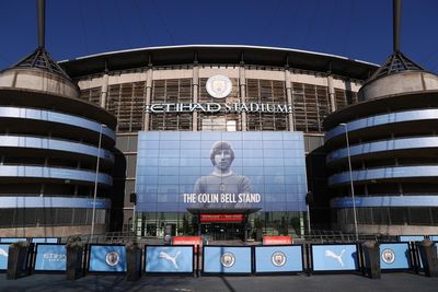 Ban for Manchester City fan who threw flare on to playing area in title decider