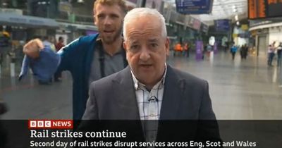 BBC journalist praised after swearing man randomly interrupts during show at Manchester Piccadilly station