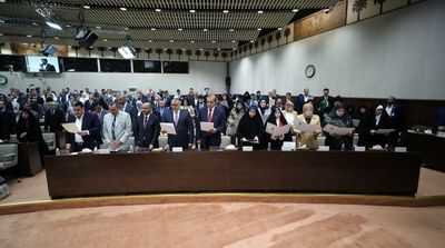 Iraq Parliament Swears in New Members after Walkout of 73
