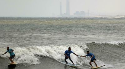 Swimming and Surfing, Gazans Savor a Cleaner Sea