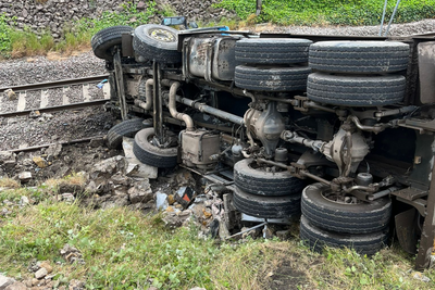 Key part of east coast mainline reopens after lorry crashes onto train tracks