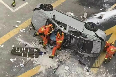 Two killed as Nio electric car falls from third floor office in Shanghai