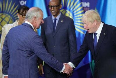 Friends again? Boris Johnson greets Prince Charles after Rwanda row