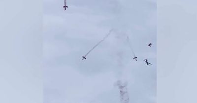 Red Devils spotted jumping from plane over stadium sparks memories