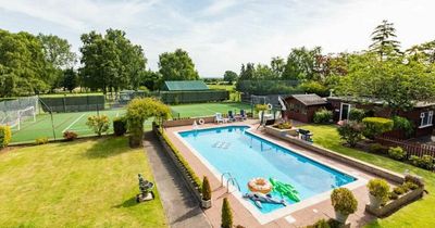Million-pound home in unexpected Greater Manchester village with an outdoor pool, tennis court and crazy golf