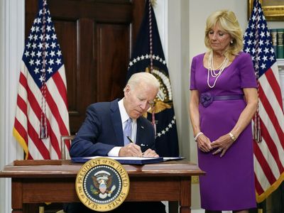 Biden signs gun safety bill into law