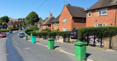 Furious residents keep their wheelie bins in the street to block hospital parking