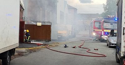 Fire crews rush to tackle blaze at commercial property close to Bury centre