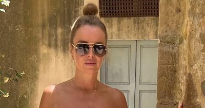 Amanda Holden looks stunning in white bikini during trip to Sicily with Alan Carr