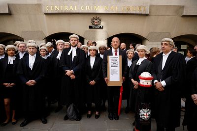 UK trial lawyers stage walkouts in dispute over funding