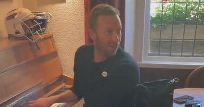 Coldplay's Chris Martin enjoys a pint at near pub on way home from Glastonbury