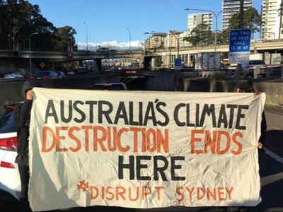 11 arrested during massive climate protest that brings parts of Sydney to standstill