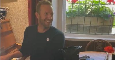 Coldplay frontman Chris Martin entertains pub customers after partying at Glastonbury