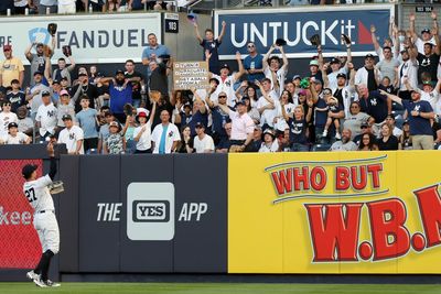 Yankees fans cheering on a young fan to complete the bottle flip challenge is the best