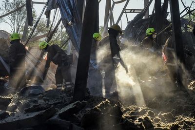 Desperate hunt for survivors at Ukraine shopping mall as Macron calls attack ‘a new war crime’