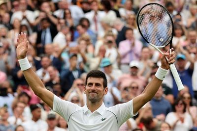 Djokovic survives scare to win 80th match at Wimbledon