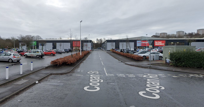 Man charged and woman hospitalised after 'four-vehicle crash' at Glasgow retail park
