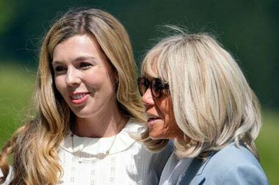 G7: Carrie Johnson and Brigitte Macron show united front at partners Biathlon event