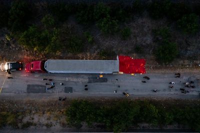 Three in custody after 46 migrants found dead in San Antonio tractor-trailer