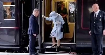 The Queen filmed hopping on and off train unaided amid mobility concerns