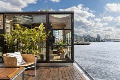 London’s hippest houseboat: Dutch barge with three bedrooms, cinema and Battersea mooring for sale for £1.8m