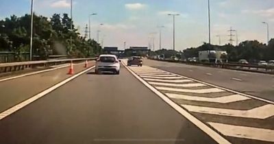 M1 driver caught breaking double solid white lines rule by off duty officer