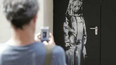 French court convicts eight for stealing Banksy from Bataclan