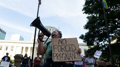 Protests spread, state abortion bans begin after US justices strike down Roe v. Wade