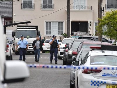 Man charged over Ahmad shooting murder