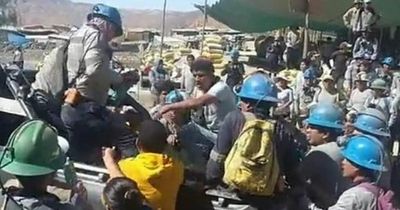 At least 100 miners trapped after tunnel 'attack', weeks since 14 died in gunfight